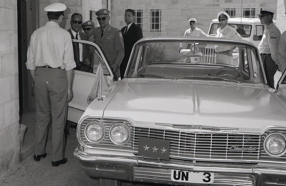 Dr. Ralph J. Bunche, former United Nations Under Secretary General for Special Political Affairs and Lieutenant General Odd Bull Head, of Mission and Chief of Staff UNTSO arriving at UNTSO HQ Jerusalem April 1964